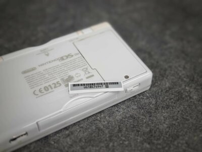 DS Lite Serial Number Sticker